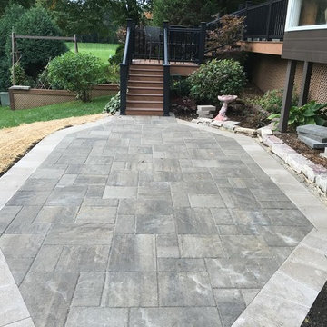 Unilock Beacon Hill flagstone with sandstone coping border