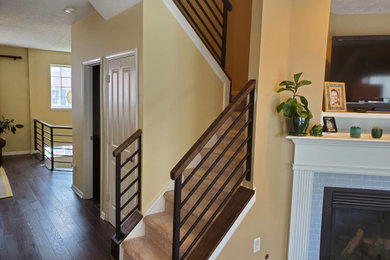 Inspiration for a large modern staircase remodel in Indianapolis