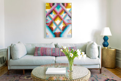 Living room - mid-sized transitional enclosed medium tone wood floor living room idea in San Francisco with white walls, a standard fireplace, a brick fireplace and no tv