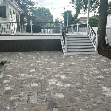 Merrick | Traditional New Nicolock Paver Patio, Fiberon Decking, and Landscaping