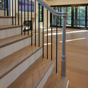 Project #93 | Captivating Staircase with Light Wood and Black Spindles
