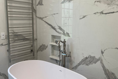 Bathroom - large modern master red tile and porcelain tile bathroom idea in Seattle with quartzite countertops, white countertops and a freestanding vanity