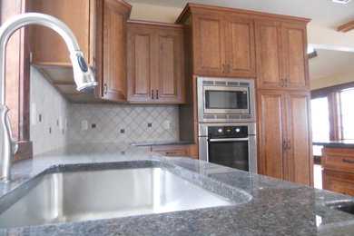 Example of a mountain style kitchen design in New York