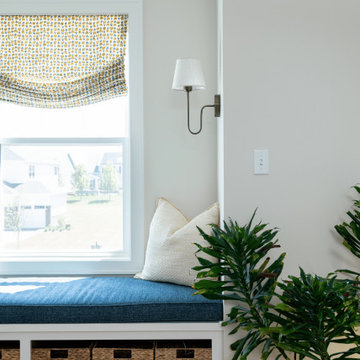 Cozy Loft Window Nook with Blue Bench Cushion & Roman Shades