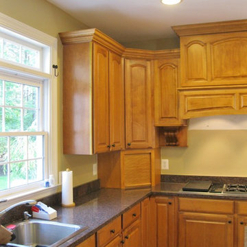 Custom Built Stove Hood and additional doors and moldings to Kitchen