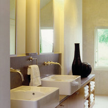 narrow vanity with built-in towel storage