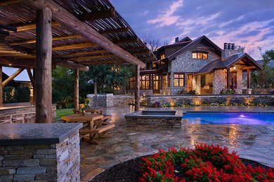 Hot tub - rustic hot tub idea in Calgary