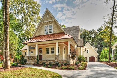 This is an example of a traditional two-storey beige exterior in Charlotte.