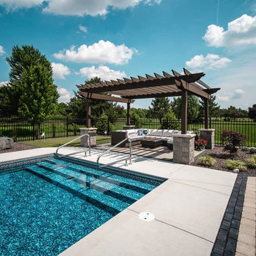 Versatile Outdoor Escape: Turf, Patio, Pergolas & Water Features