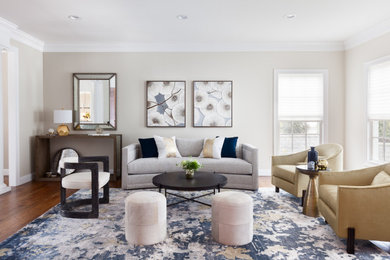 Huge transitional formal medium tone wood floor and brown floor living room photo in Other with beige walls, no fireplace and no tv