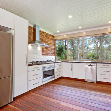 Spacious outdoor kitchen packed with appliances