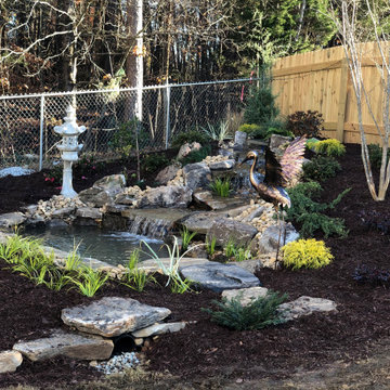 Backyard water feature, how to use the lay of the land to your advantage!