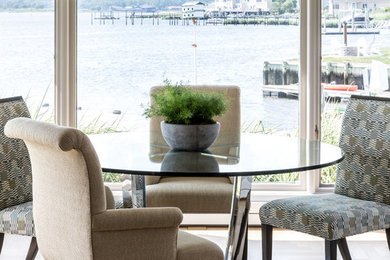 Inspiration for a mid-sized transitional light wood floor and brown floor enclosed dining room remodel in Miami with no fireplace