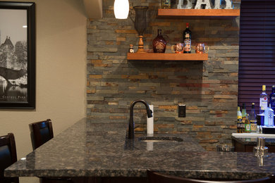 Large transitional walk-out porcelain tile basement photo in Denver with beige walls