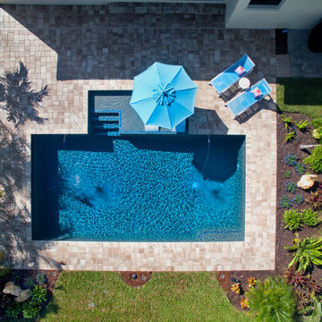Modern Pool with Advanced LED Lighting and Water Features
