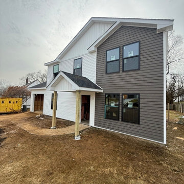 Wood composite and vinyl siding exterior