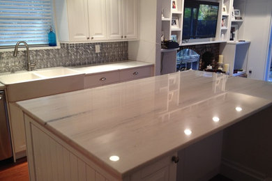Custom kitchen island with white quartzite top