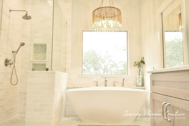 Master subway tile porcelain tile, white floor and double-sink bathroom photo in Austin with raised-panel cabinets, a two-piece toilet, an undermount sink, marble countertops, white countertops and a freestanding vanity