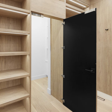 Modern New Home - Hidden Door Master Closet Wood Grain Melamine