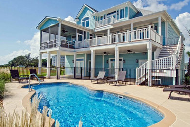 Coastal exterior home idea in Other