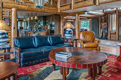 Large mountain style open concept living room photo in Other