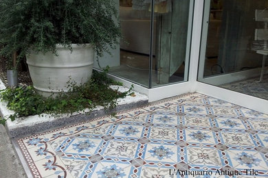 Entryway - shabby-chic style ceramic tile entryway idea in Tokyo