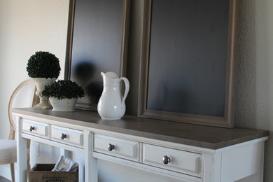 Example of a large classic dark wood floor kitchen/dining room combo design in Other with gray walls