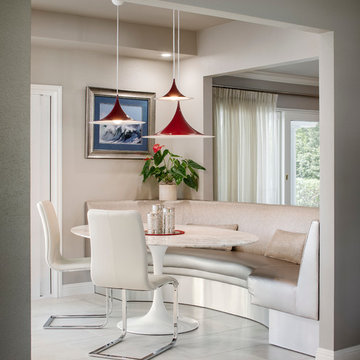 Kitchen with built in white banquette