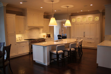 Eat-in kitchen - transitional medium tone wood floor eat-in kitchen idea in Other with an undermount sink, recessed-panel cabinets, white cabinets and an island