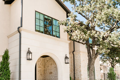 Two-story house exterior photo in Dallas with a tile roof
