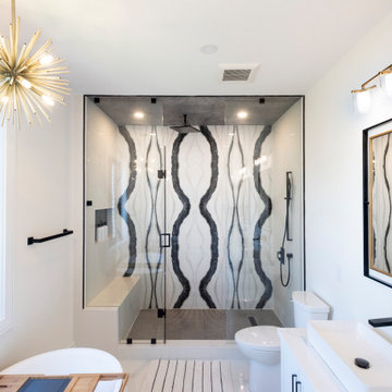 One of a kind primary ensuite with black and white theme