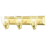 Livex Lighting - Polished Brass Transitional, Colonial, Vanity Sconce - Bring a beautiful new look to your bathroom or vanity area with this charming three-light vanity sconce from the Birmingham collection. A wide rectangular polished brass finish back plate supports three simple graceful arms that hold three hand blown clear glass shades. The clean lines of this updated classic will make this piece an appealing part of your home.