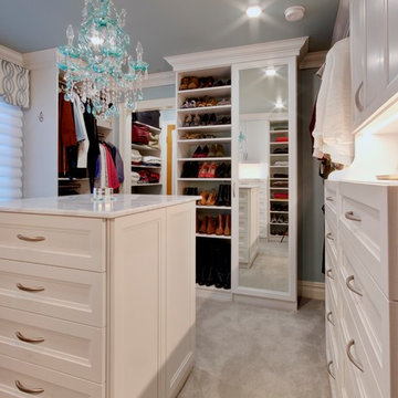Large White Textured Walk-In Closet with Island