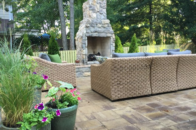 This is an example of a backyard patio in Baltimore with concrete pavers.