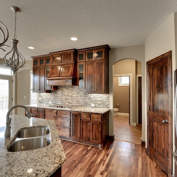 Architectural Designs Exclusive Plan 73352HS - Three Level Craftsman Beauty
