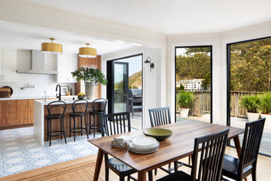 Huge tuscan single-wall eat-in kitchen photo in San Francisco with an undermount sink, flat-panel cabinets, dark wood cabinets, quartz countertops, ceramic backsplash, stainless steel appliances, an island and gray countertops