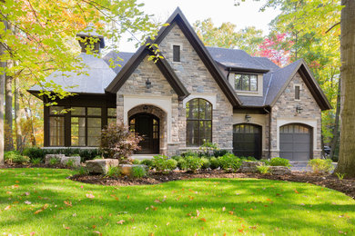 Inspiration for a large traditional two-storey exterior in Toronto.