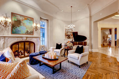 Huge transitional open concept medium tone wood floor family room photo in Denver with a music area, beige walls, a standard fireplace, a stone fireplace and no tv