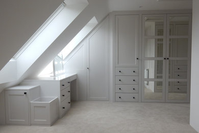 Design ideas for an expansive contemporary wardrobe in West Midlands.