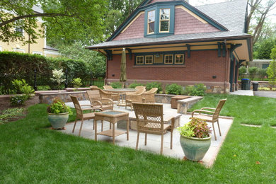 This is an example of a traditional side yard garden in Providence.