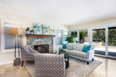 Example of a transitional family room design in Orange County
