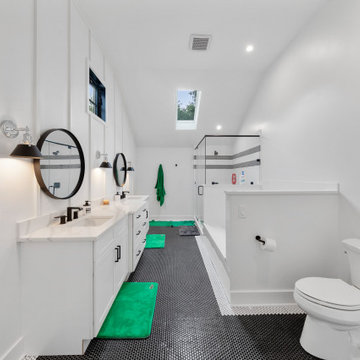 Secondary Bathroom with Vaulted Ceiling & Black Penny Tile – Home Addition in Fl
