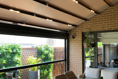 Oztech Retractable Roof System with Ziptrak clear PVC blind