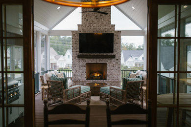 This is an example of a transitional porch design in Other.