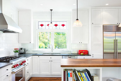 Elegant kitchen photo in Vancouver