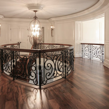 Project #74 | Circular Staircase with Hand-Forged Metal Panels
