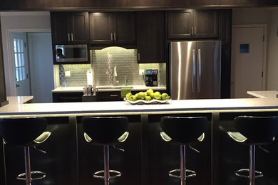 Example of a mid-sized transitional kitchen design in Kansas City