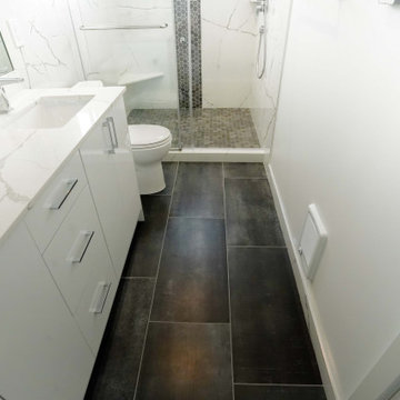 Contemporary Marbled Bathroom with Dark Floorings