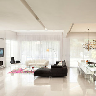 Inspiration for a huge modern beige floor living room remodel in Other