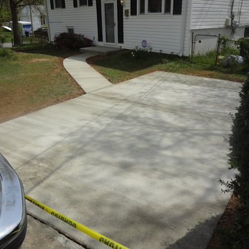 New driveway with a walkway and steps with front stoop rebuild.
